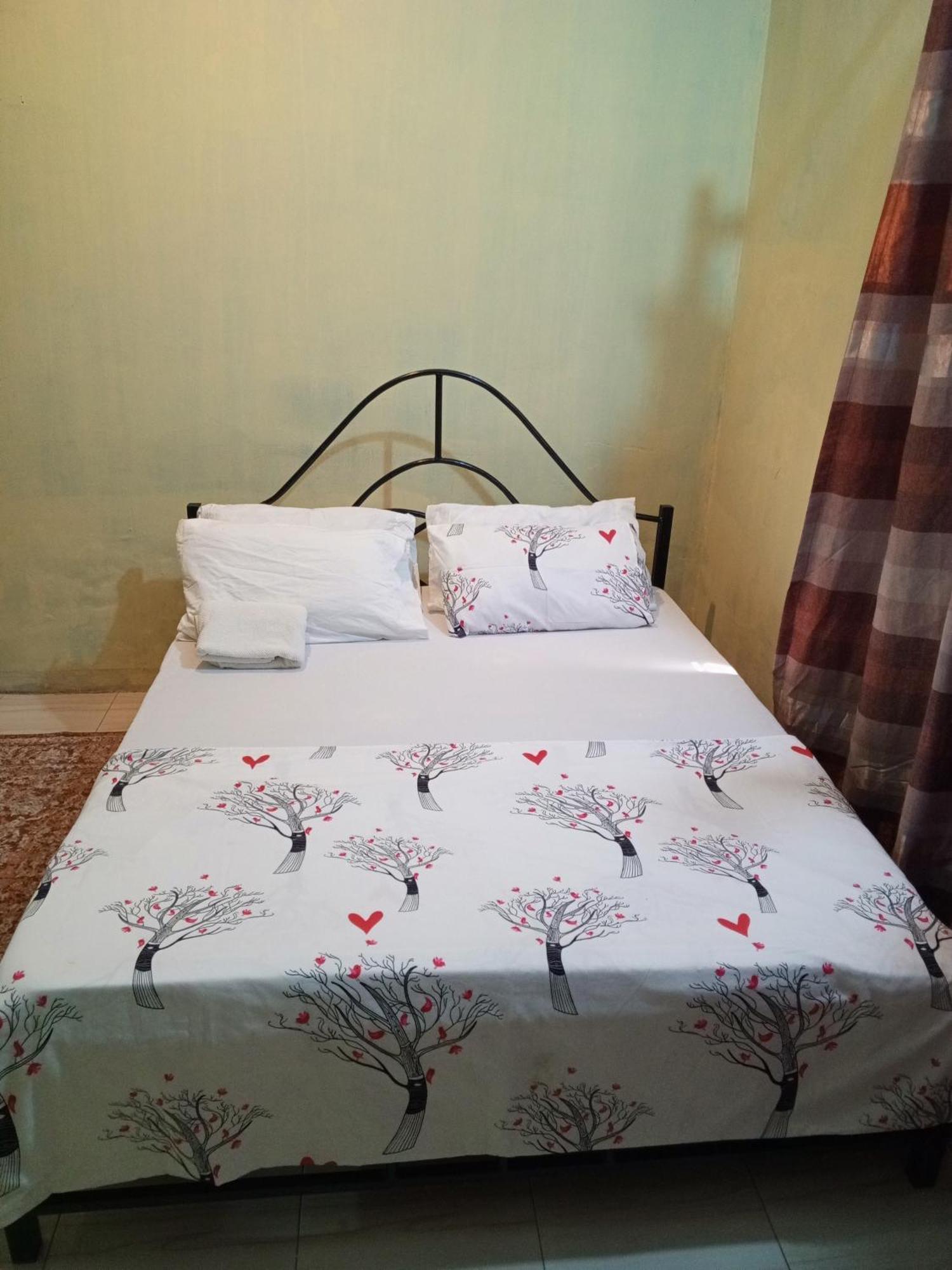 Serenity Homestay Дар-эс-Саламе Экстерьер фото