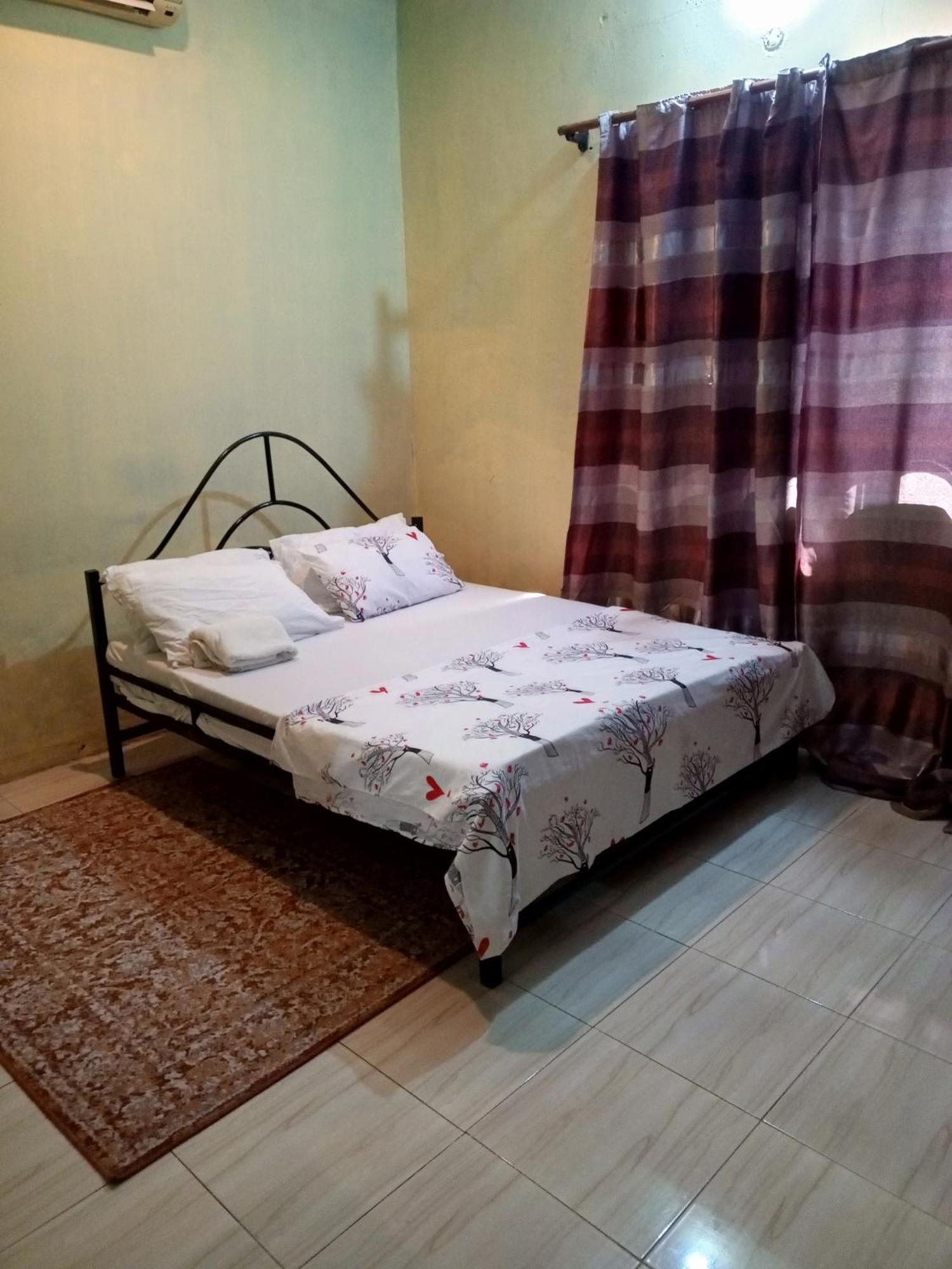 Serenity Homestay Дар-эс-Саламе Экстерьер фото